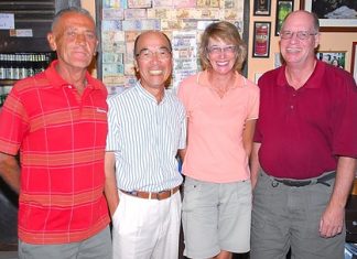 Flight winners Mashi Kaneta and Carole Kubicki, center, with Brian Gabe and Jack Robertson.